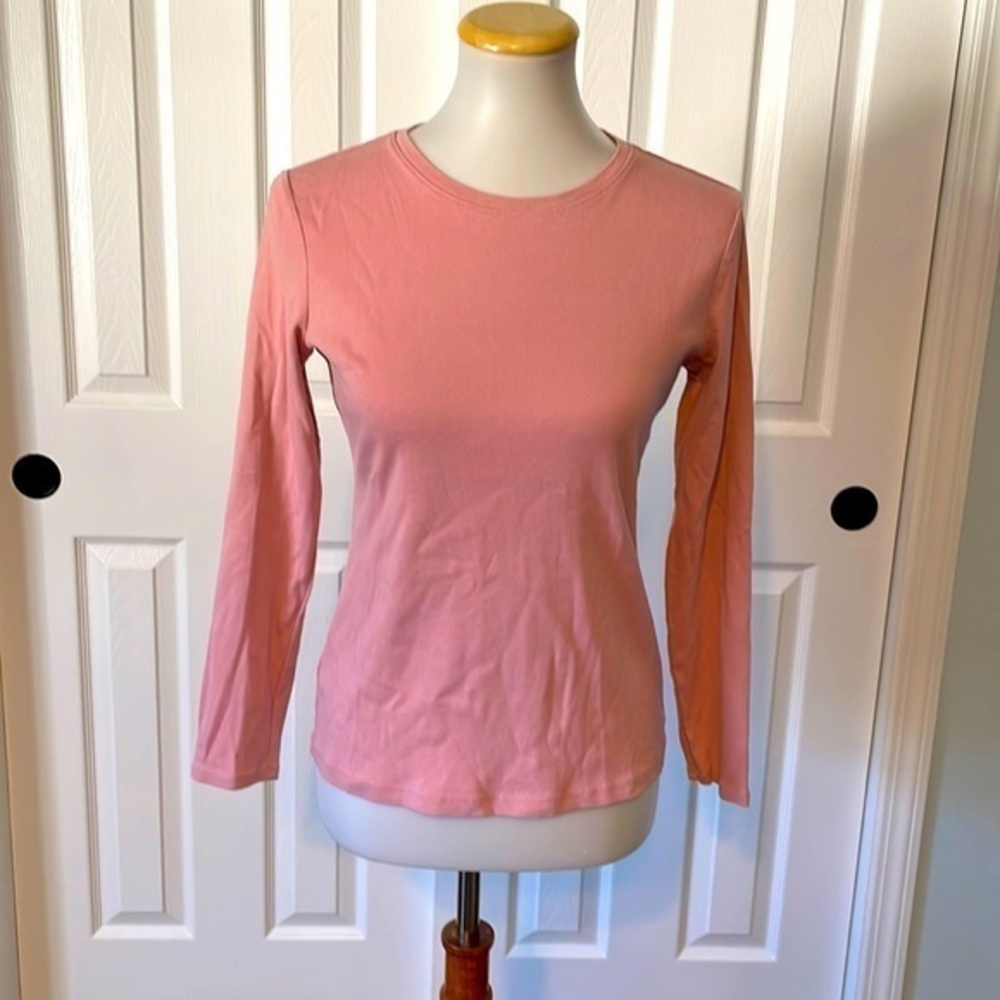 Ann Taylor long sleeve light pink blouse, thick material and has some stretch.